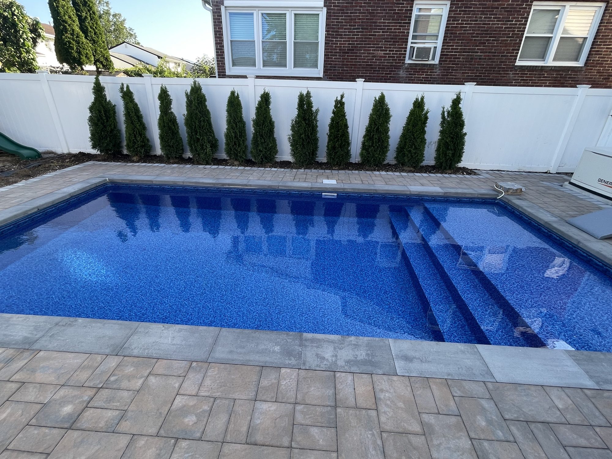 Modern Pool with Custom Stadium Steps