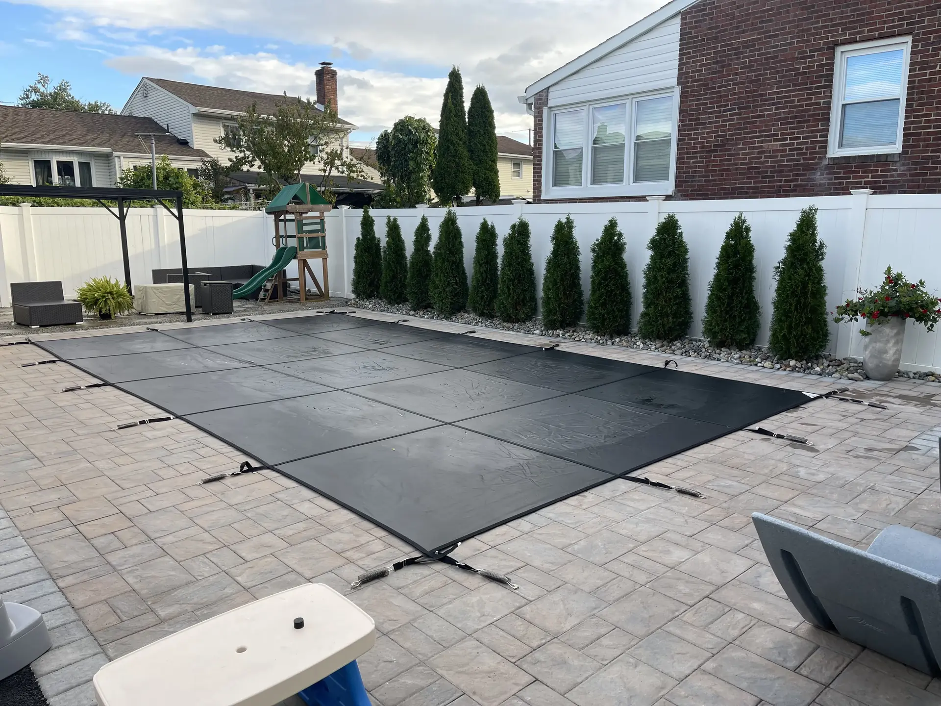 Pool closed for winter with safety cover, NJ