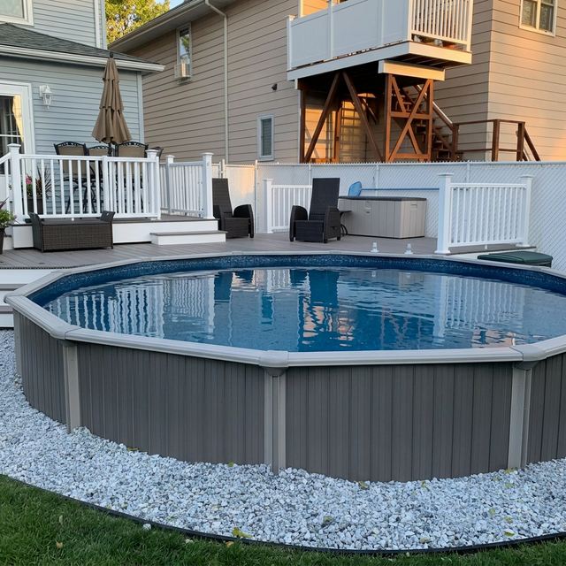 Inground pool open in summer, deck setting