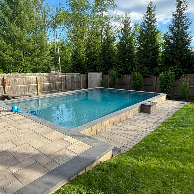 Inground rectangular pool open in summer